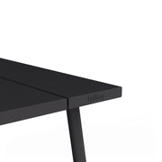 A stylish aluminum table designed for flexible outdoor dining.
