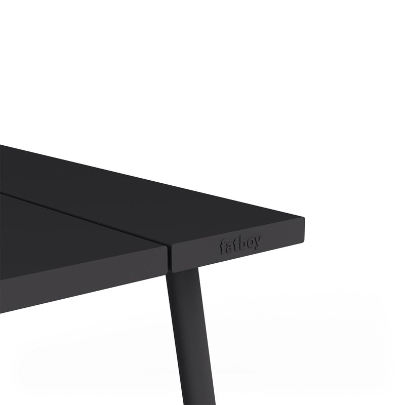 A stylish aluminum table designed for flexible outdoor dining.