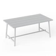 Fred’s Medium Table in light grey is a modern aluminum outdoor table for shared meals.