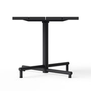 Outdoor bistro table with adjustable feet pad for uneven surfaces.