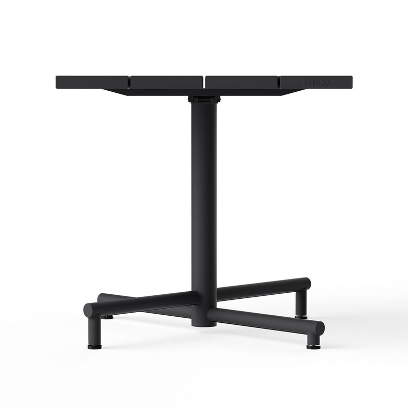 Outdoor bistro table with adjustable feet pad for uneven surfaces.