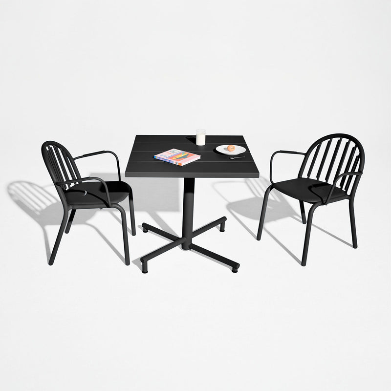 A modern aluminum bistro table perfect for balconies and patios.