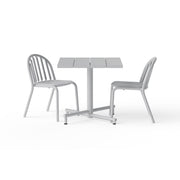 An outdoor bistro set in light grey with an 80×80 cm square table and two stackable chairs, designed for everyday outdoor use.