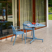 Modern square bistro set featuring a weather-resistant table and lightweight aluminum chairs.