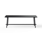 Fred’s Outdoor Table as the centerpiece of a rooftop terrace, combining modern design with functional durability.
