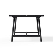 Side view of Fred’s Table, showing its 2.20-meter length and foldable legs for easy storage.