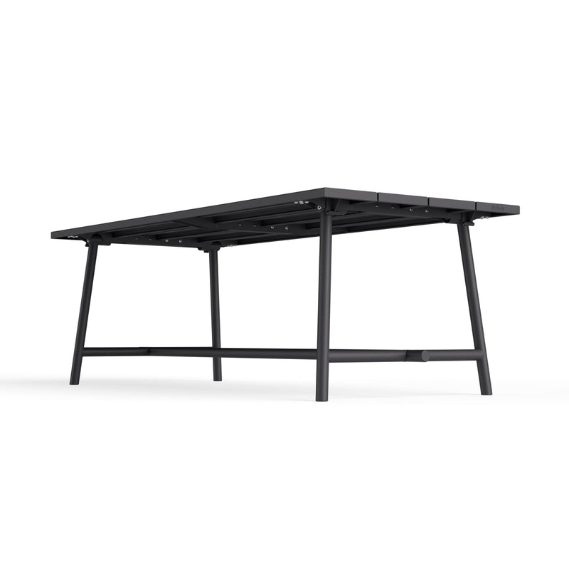 Foldable legs of Fred’s Outdoor Table, emphasizing its compact storage solution for colder months or smaller spaces.