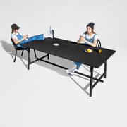 Fred’s Outdoor Table ready for dining, offering a modern twist on the classic dining table design with wide slats and a sleek finish.