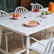 Sturdy round aluminum legs of Fred’s Outdoor Table, providing stability on uneven outdoor surfaces like patios and lawns.