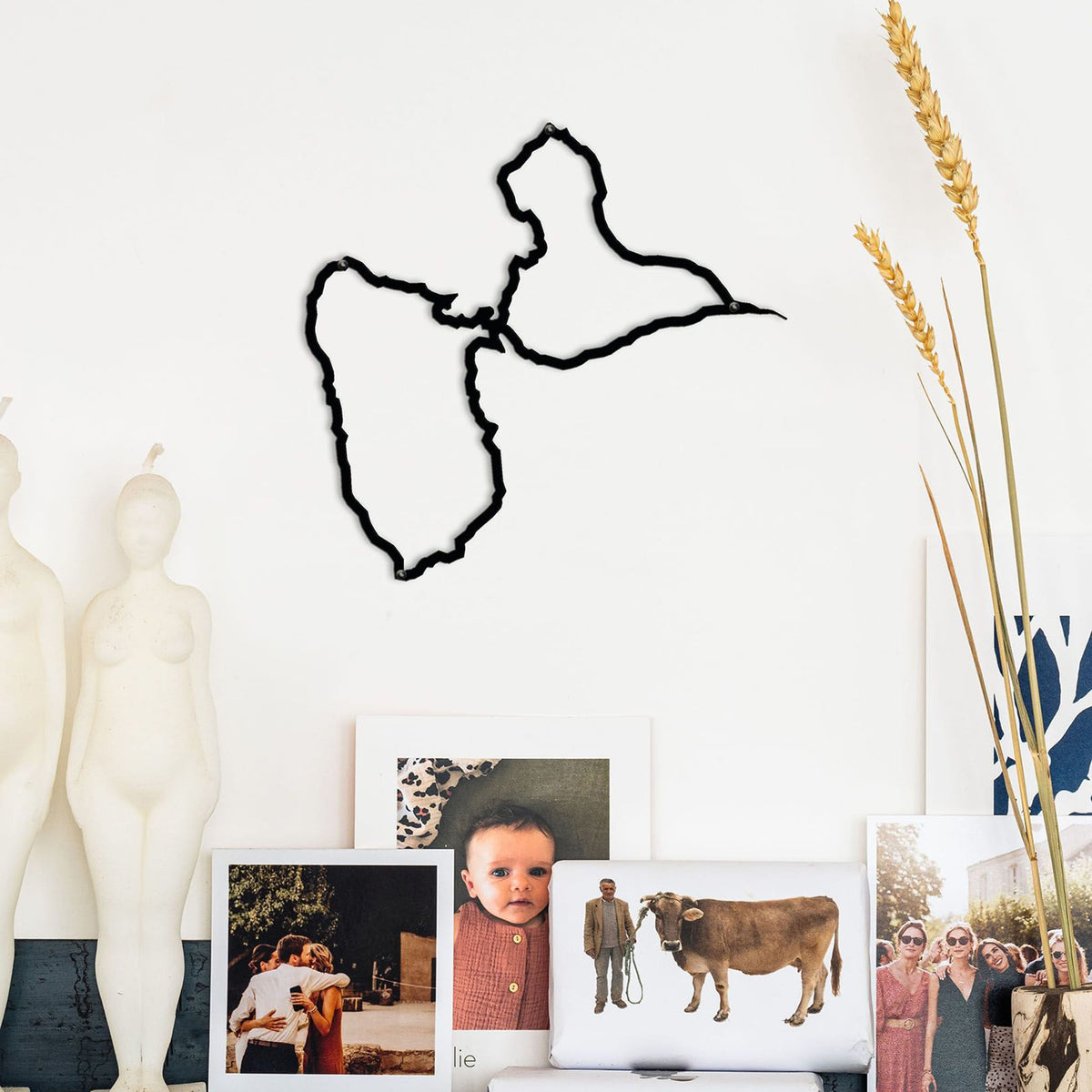 The Island Collection: Artistic metal silhouettes capturing iconic island shapes, perfect for serene home décor.