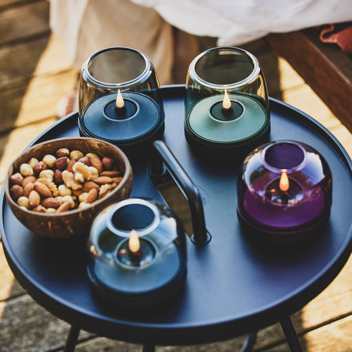 Glow 08 candle holder by Kooduu: modern brushed aluminum and glass design, offering 100+ hours of safe LED candlelight.