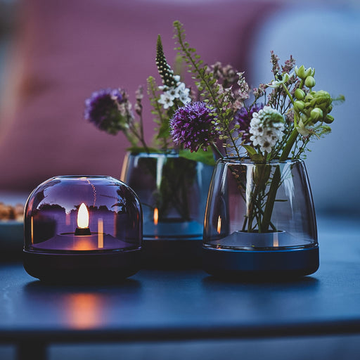 Glow 10 candle holder by Kooduu: luxurious brushed aluminum and handmade glass with over 100 hours of rechargeable LED light.