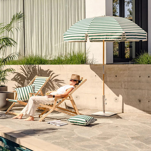 Elegant Jardin Patio Umbrella by Basil Bangs, featuring durable fabrics, UPF50+ sun protection, and a classic domed design.
