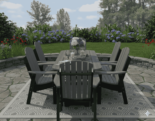 Krahn outdoor patio set with table and chairs on a stone patio with garden in the background