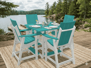 Krahn aruba and white outdoor poly bistro set by a lake with a scenic background.