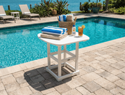 White krahn poly bistro table by a pool with towels, a basket, and drinks on a sunny day.