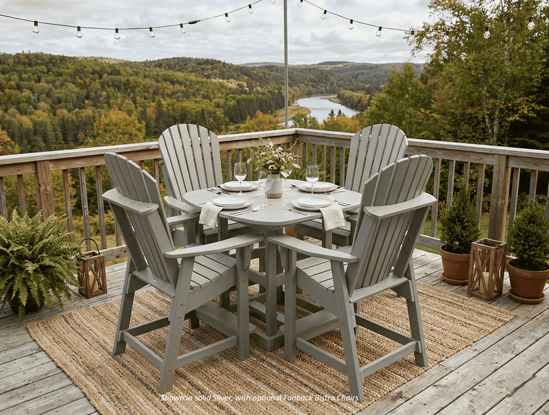 Outdoor patio set with krahn outdoor poly bistro table and krahn bistro chairs on a deck overlooking a scenic landscape.