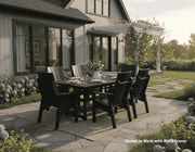 Krahn outdoor dining set on a patio in front of a house with a pergola.
