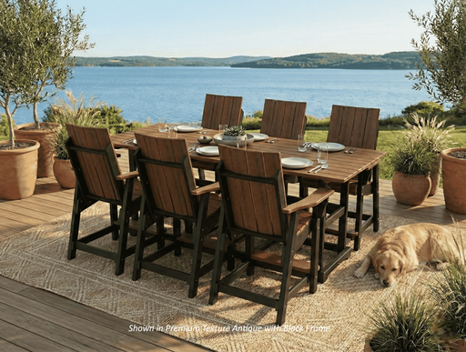Krahn outdoor poly dining set with recycled plastic chairs and table by a lake, featuring a dog on a deck.