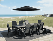 Krahn Outdoor 8' dining set with black Frankford Monterey G-series umbrella on a deck overlooking a beach. My Outdoor Room Shediac