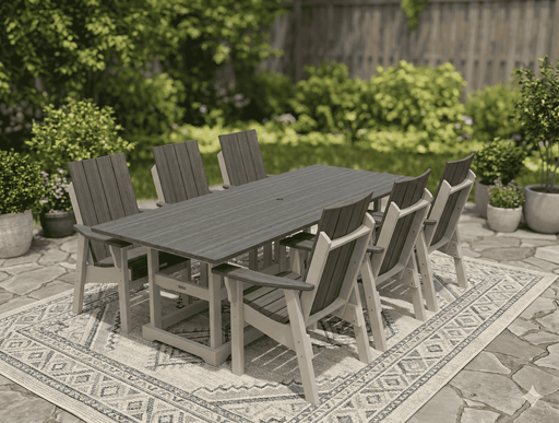 Krahn Outdoor dining set with a large table and chairs on a patio with greenery in the background. My Outdoor Room Shediac NB