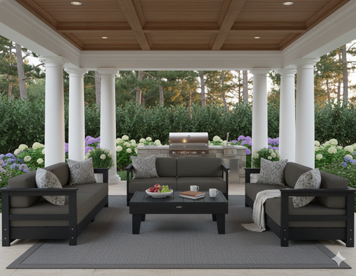 Recycled Poly Coffee Table surrounded by poly deep seat sofas with sunbrella cushions