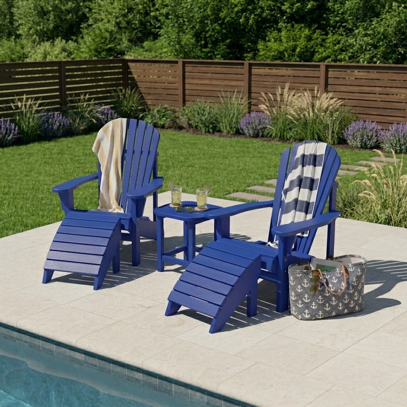 Two Cobalt Krahn Adirodack Chairs with Krahn footrests and end table by a backyard pool