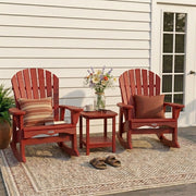 Two red Krahn Adirondack Patio Rockers with a Krahn end table on a porch