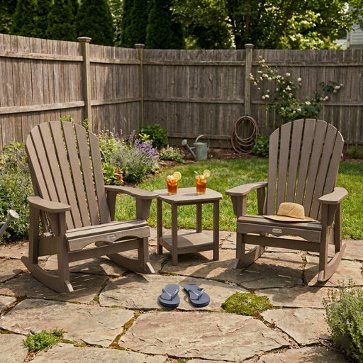 Two Weathered Wood Krahn Patio Rockers in a backyard patio setting