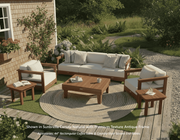 Krahn Deep Seat Deluxe Sofa in an outdoor patio set with wooden furniture and cushions on a grassy area.