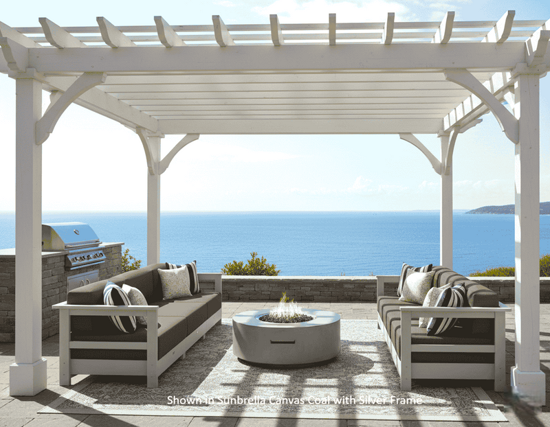 Krahn outdoor furniture, deep seat sectional sofa set under a pergola, seating area, and fire pit overlooking the ocean.