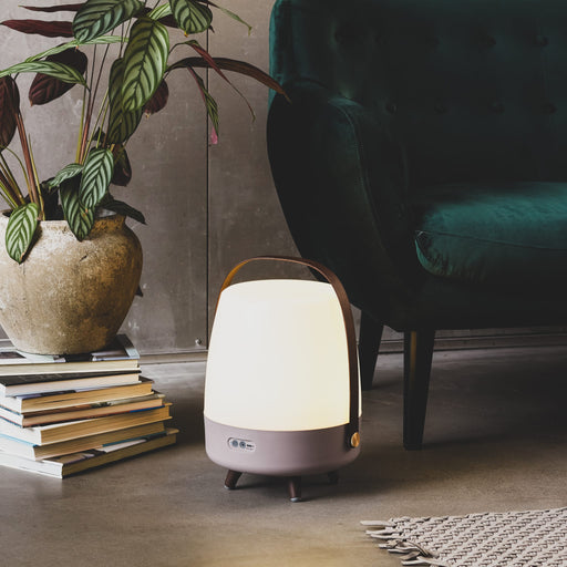 Lite-up Play wireless speaker and lamp: portable design with warm LED light and Bluetooth pairing for immersive sound.