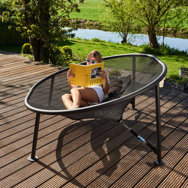 Experience ultimate relaxation with Netorious by Fatboy, the perfect blend of modern design, comfort, and durability for outdoor lounging.