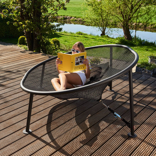 Experience ultimate relaxation with Netorious by Fatboy, the perfect blend of modern design, comfort, and durability for outdoor lounging.