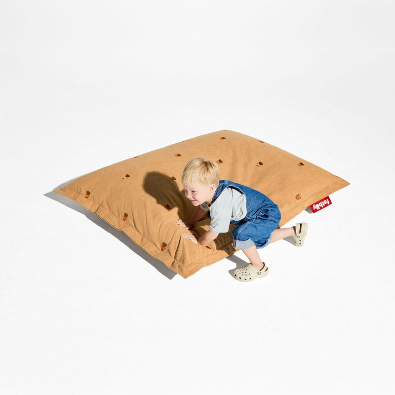 Cozy, slim bean bag in recycled corduroy, perfect for kids’ rooms and living spaces.