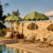 Pagoda is a vintage-inspired umbrella with commercial-grade construction, UPF50+ fabric, and vented canopy by Basil Bangs.