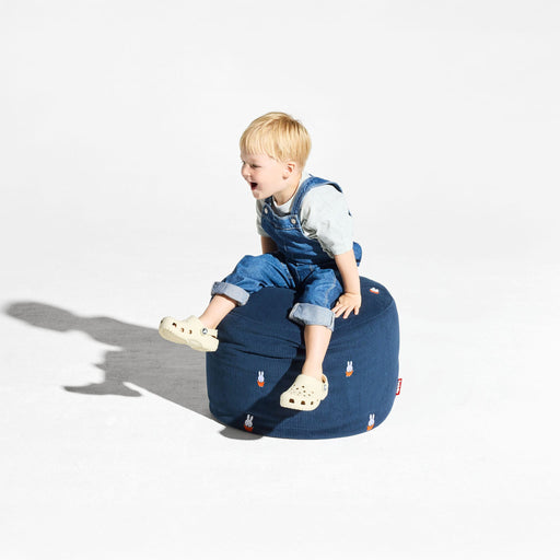A compact indoor pouf with embroidered Miffy details and everyday versatility.