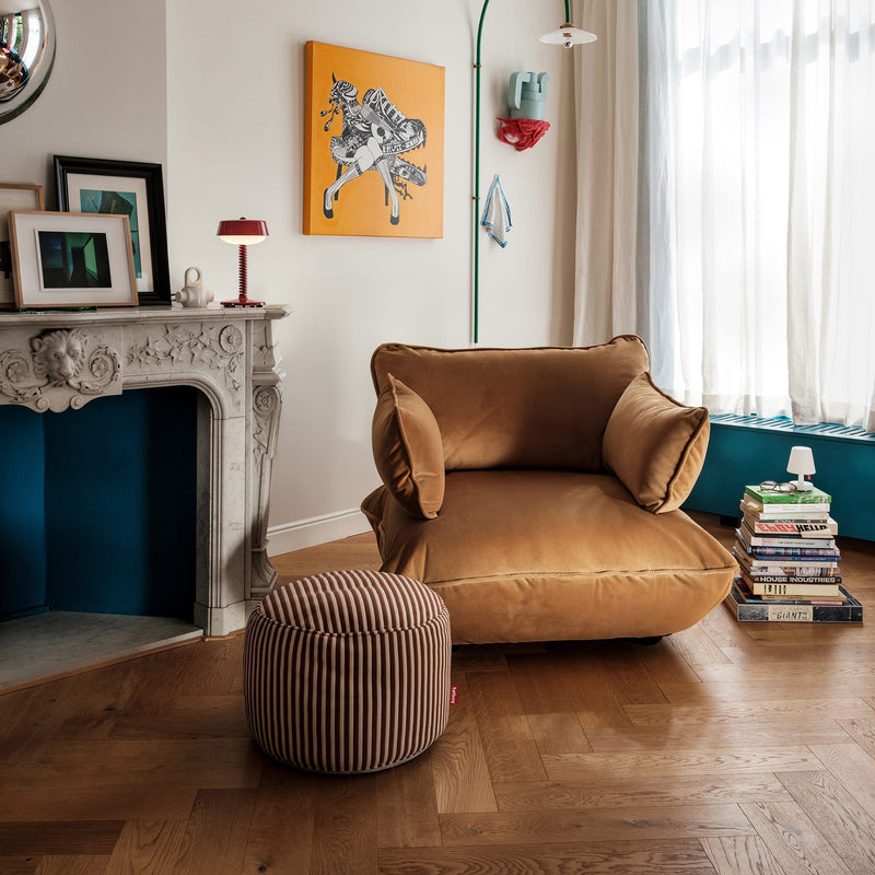 Cozy, versatile pouf with plush terry texture and anti-slip base for everyday use.