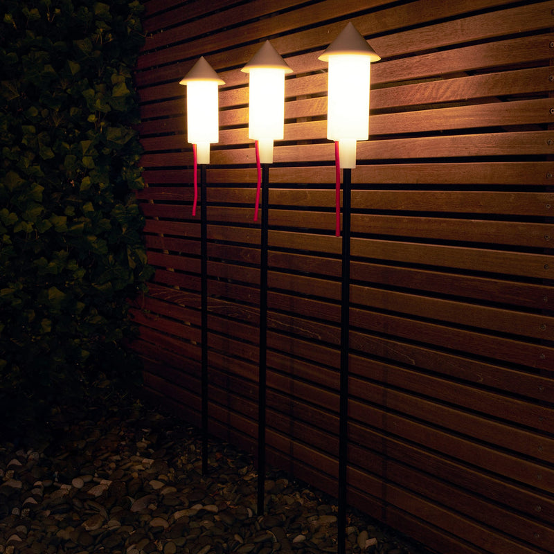 Fatboy Prêt-A-Racket solar floor lights adding whimsical charm to gardens, rooftops, or balconies.