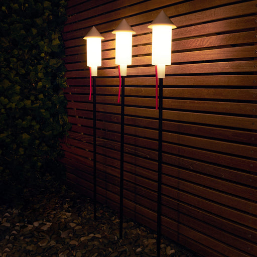 Fatboy Prêt-A-Racket solar floor lights adding whimsical charm to gardens, rooftops, or balconies.