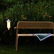 Eco-friendly Fatboy Racket la Surprise solar light with automatic dusk activation and cozy warm glow for your garden.
