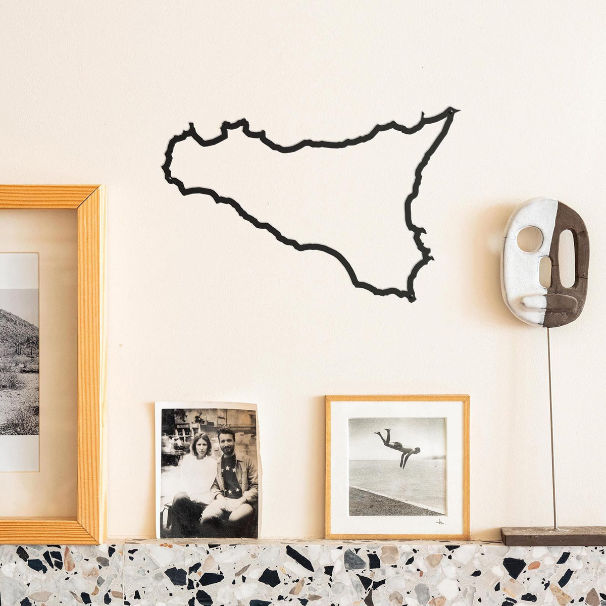 The Island Collection offers sleek metal silhouettes of famous islands, perfect for adding natural charm to décor.