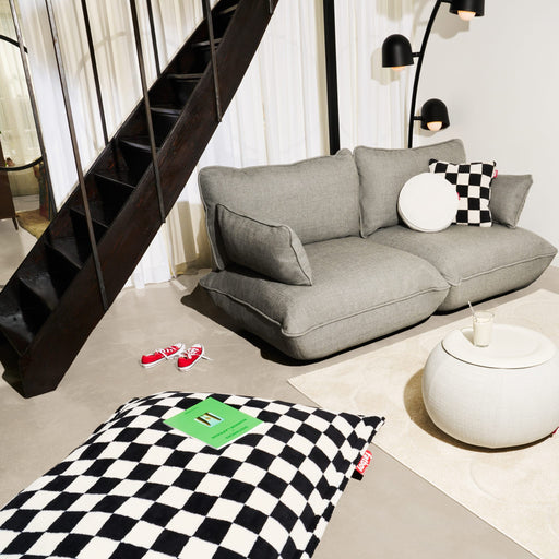 Slim, stylish bean bag combining plush teddy comfort and a modern chess-inspired pattern.