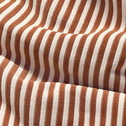 Close-up of the terry fabric in Cognac Cream by Fatboy.
