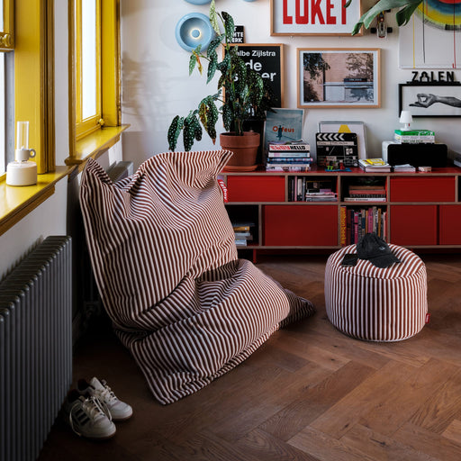 Cozy, compact bean bag with spa-like terry softness and supportive lounging feel.