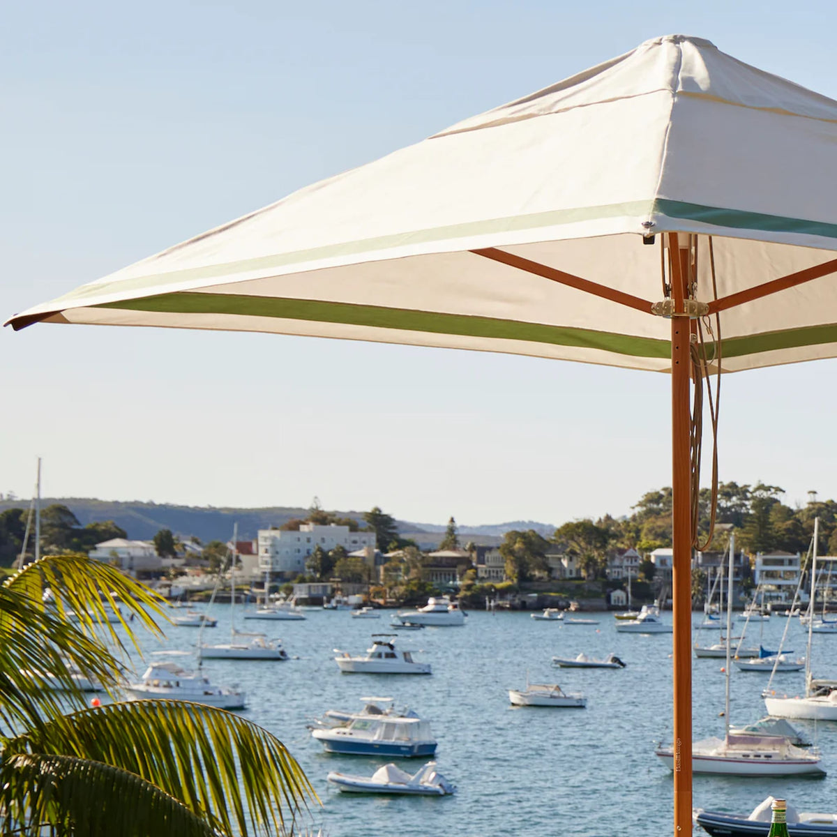 High-performance Regatta Patio Umbrella by Basil Bangs engineered to endure &quot;Gale Force&quot; winds and provide lasting outdoor comfort.