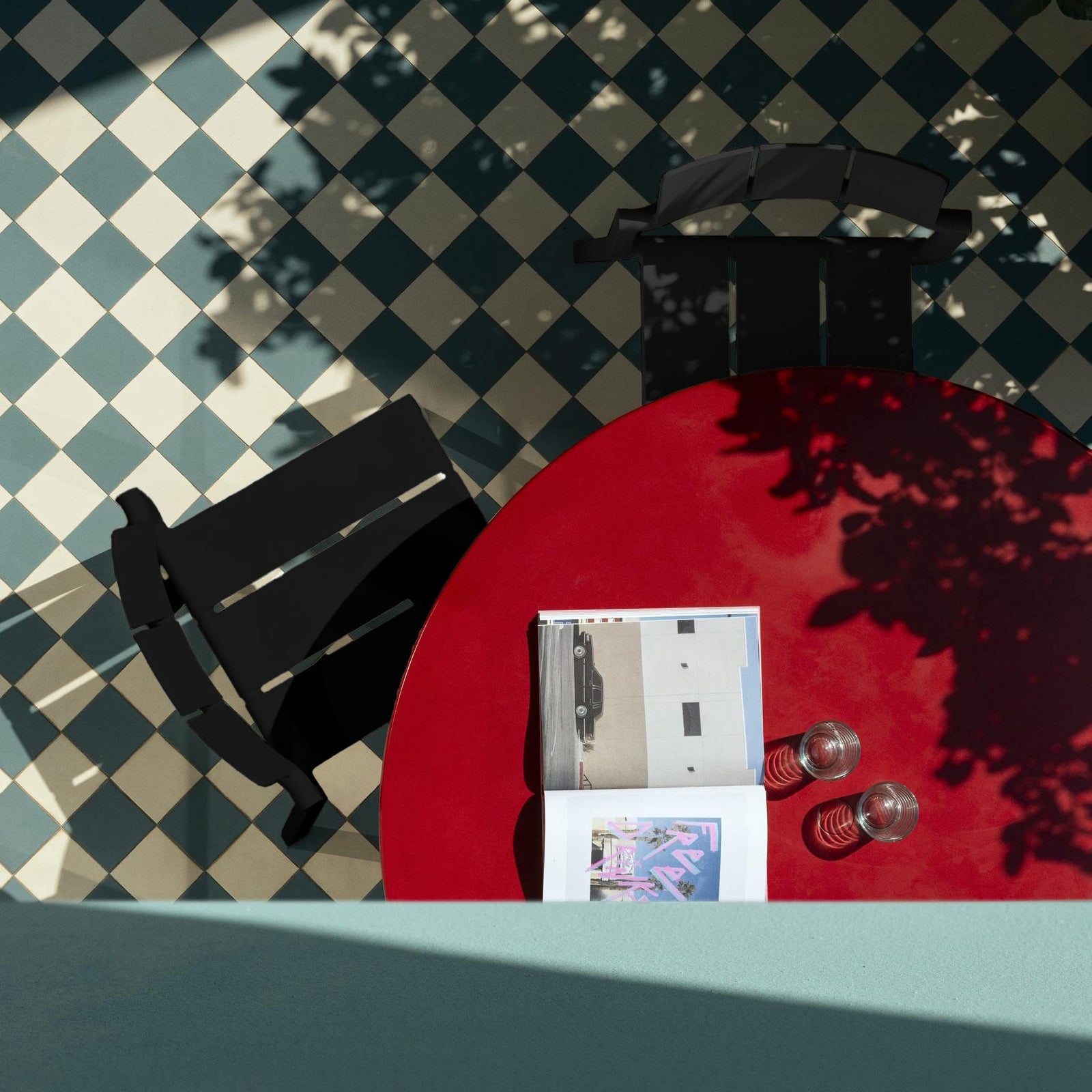 Yard chair by TOOU Design in a modern indoor setting, showcasing its sleek geometric design and durable polypropylene material.