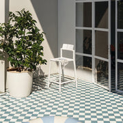 Yard counter stool by TOOU Design in a sleek kitchen setup, featuring durable polypropylene and a 68 cm seat height.