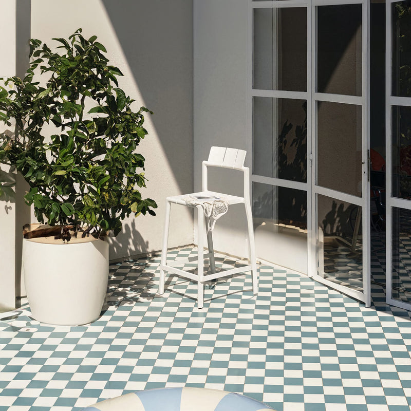 Yard counter stool by TOOU Design in a sleek kitchen setup, featuring durable polypropylene and a 68 cm seat height.