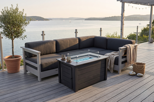 Outdoor patio set with Krahn poly and sunbrella modular sectional sofa and Affinity poly frame fire pit table on a deck overlooking water. My Outdoor Room in Canada poly furniture.